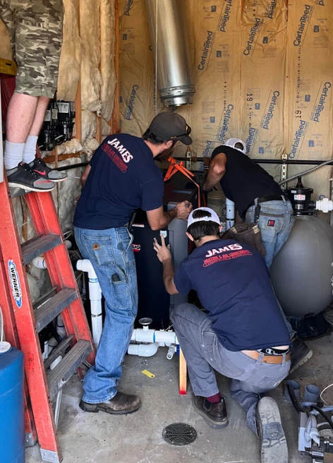 hvac specialists installing heating system