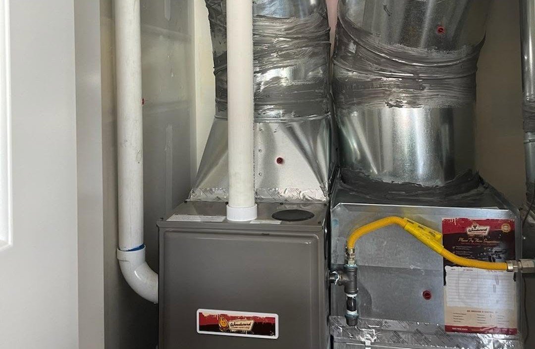 Newly installed high-efficiency gas furnace with sealed ductwork in an Oregon home