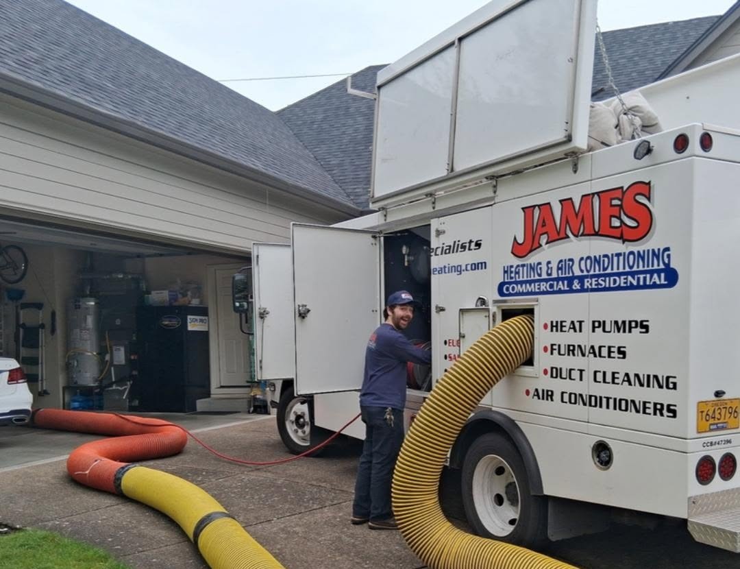 James Heating technician working from a service truck at a Springfield, Oregon home