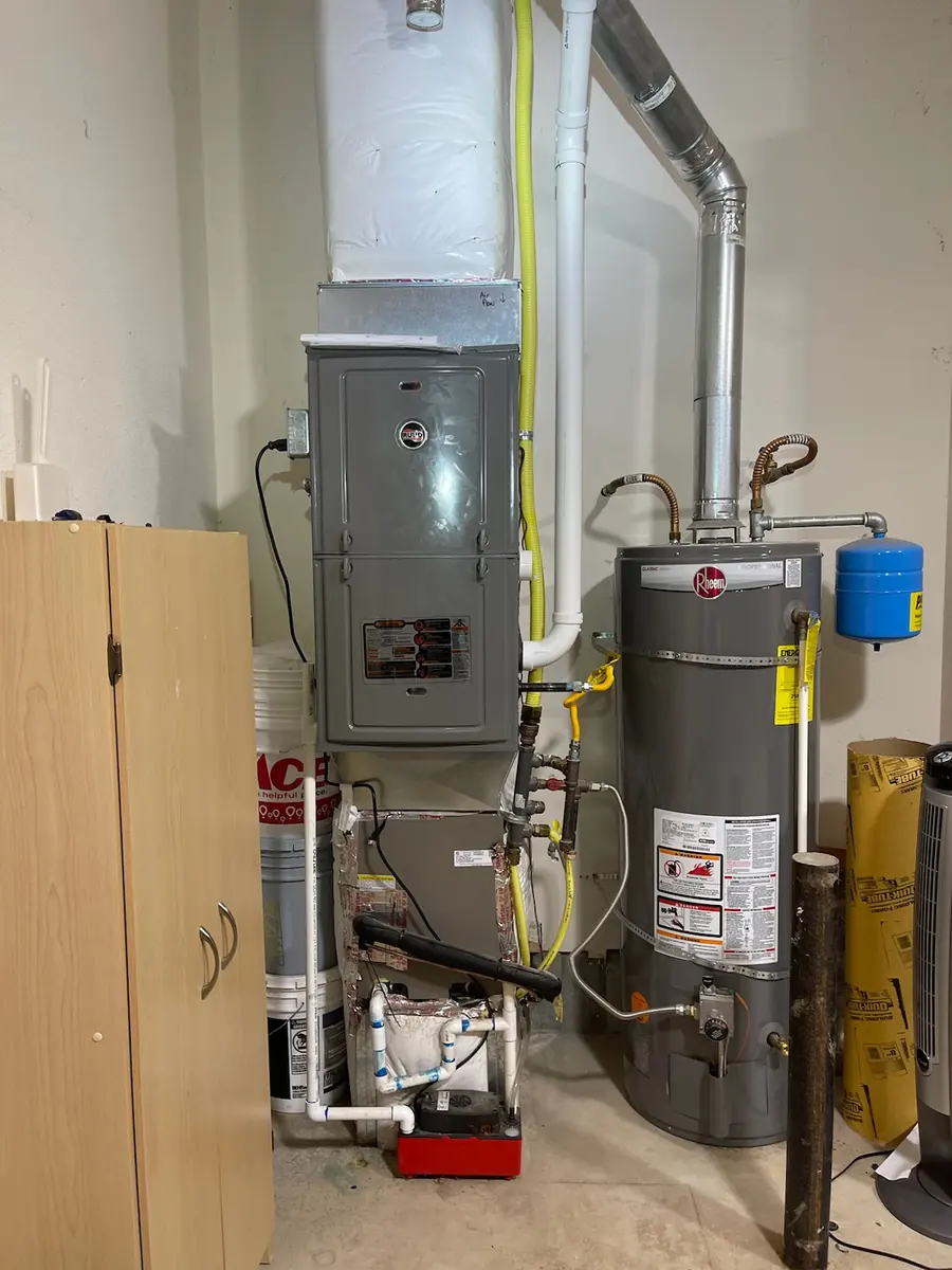 Furnace and water heater installed side by side Furnace and water heater installed side by side