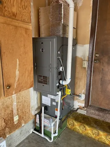 Gas furnace installed in a garage Gas furnace installed in a garage