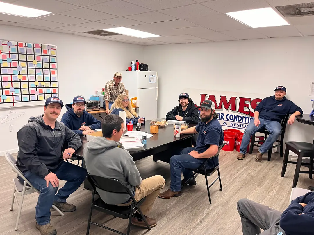 James Heating technicians meeting at the office James Heating technicians meeting at the office